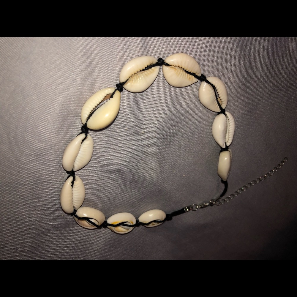 puka shell choker and bracelet/anklet set.
